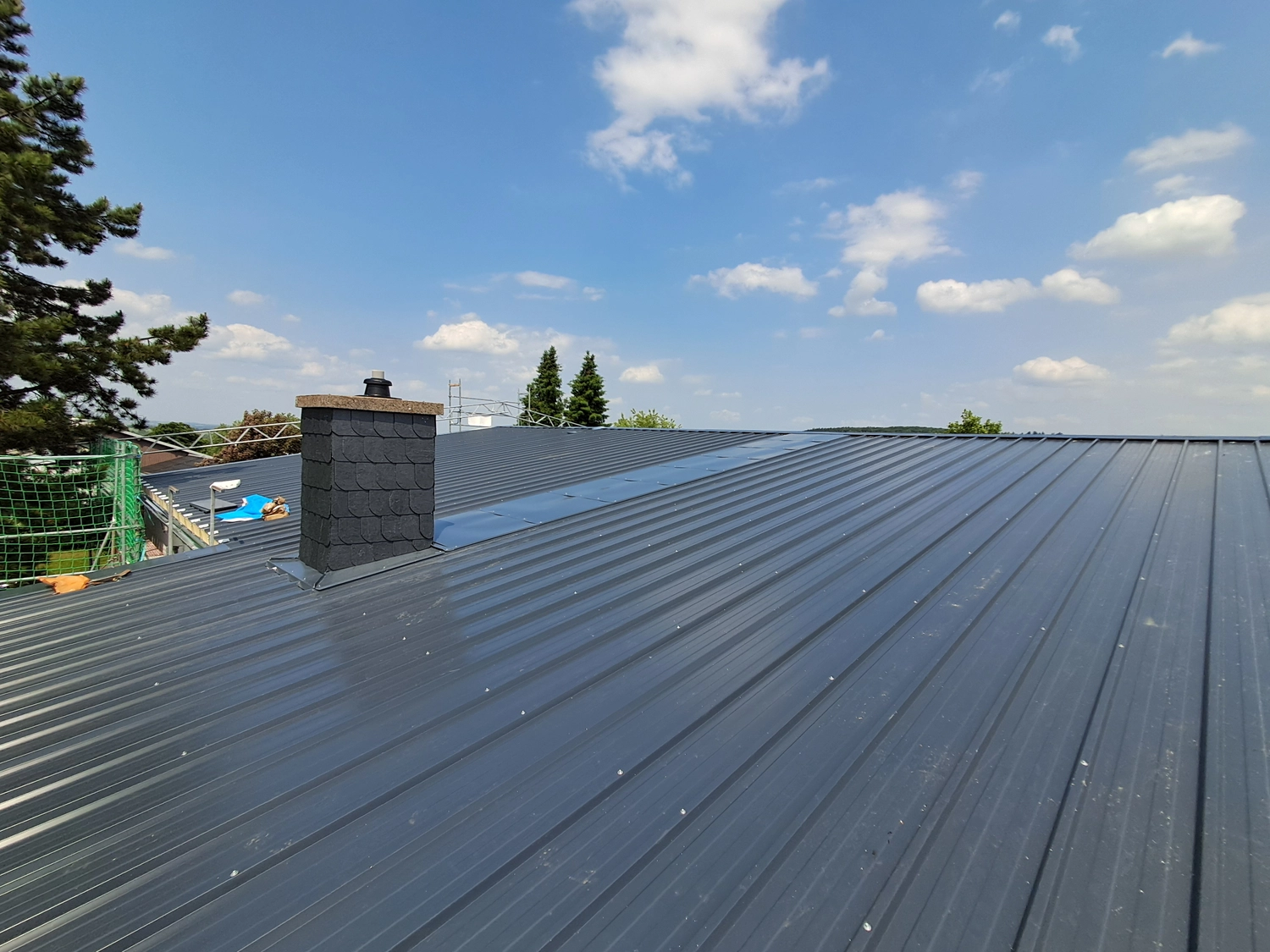 Winkelmann Dachdeckerei - Dachdeckerarbeiten an einem Gebäude