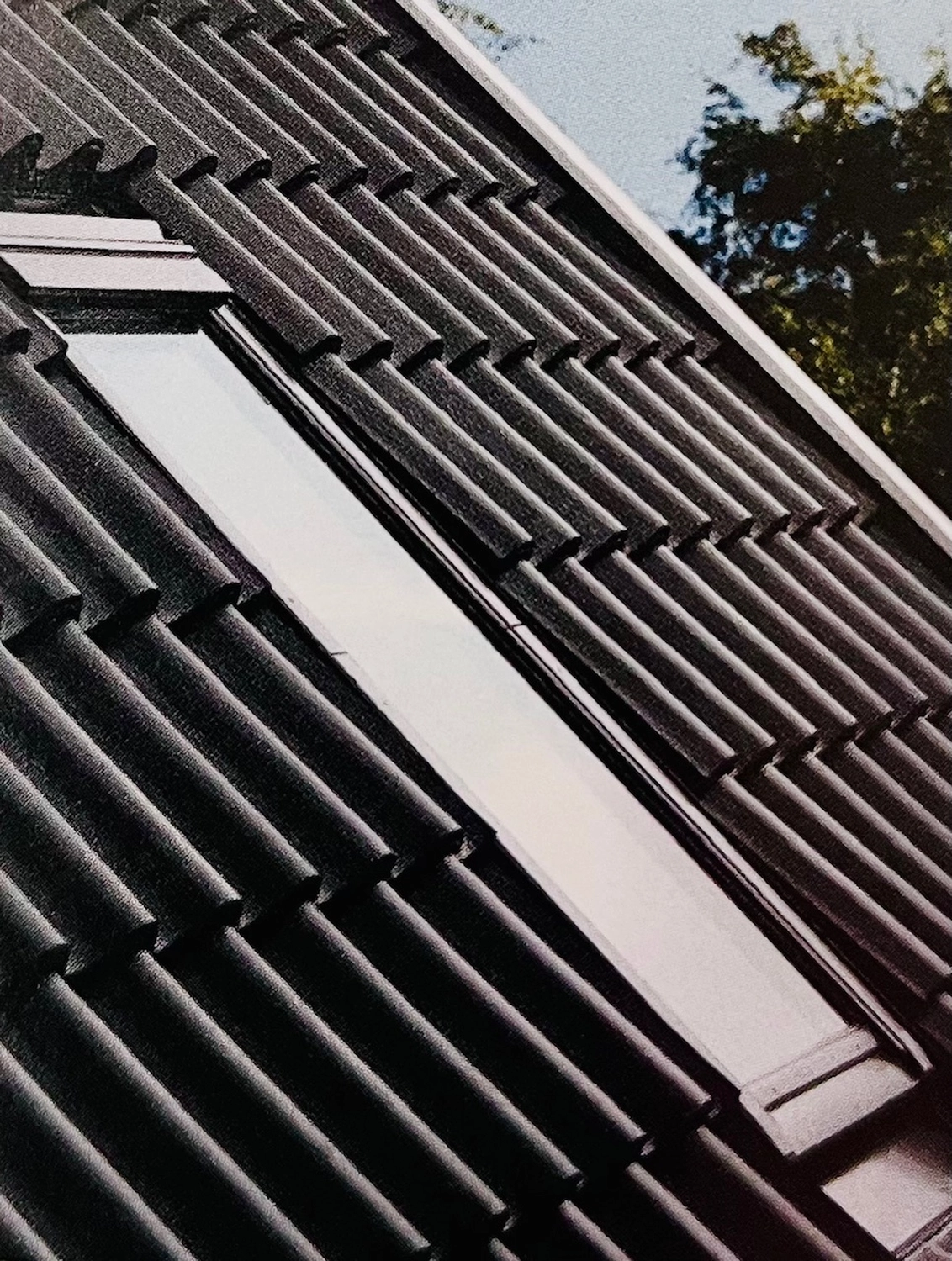 Winkelmann Dachdeckerei - Dachdeckerarbeiten an einem Gebäude