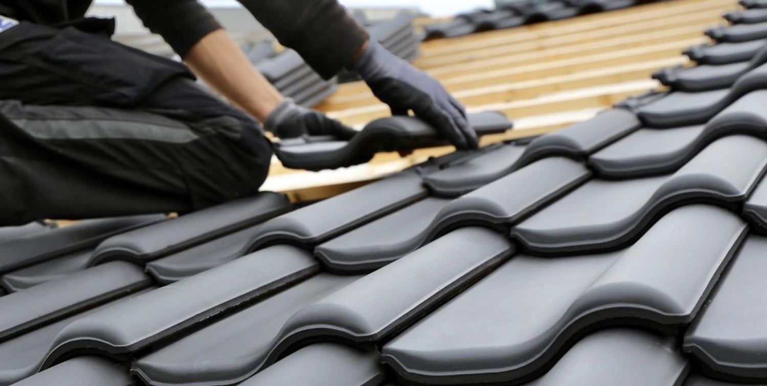 Winkelmann Dachdeckerei - Dachdeckerarbeiten an einem Gebäude